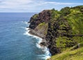 Rugged sheer lava cliffs along the coast of Maui near the Nakalele blowhole. Royalty Free Stock Photo