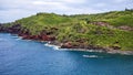 Rugged sheer lava cliffs along the coast of Maui near the Nakalele blowhole. Royalty Free Stock Photo