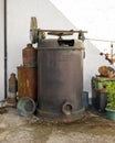 Rusted old machine by Fuentes Cardona Fundicion on display outside at Molino El Vinculo near Zhahara de la Sierra.