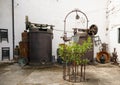 Rusted old machine by Fuentes Cardona Fundicion on display outside at Molino El Vinculo near Zhahara de la Sierra.