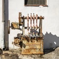 Rusted old machine by Pando Rodriquez y Compania on display outside at Molino El Vinculo near Zhahara de la Sierra.