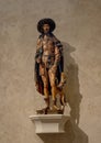 `Saint Roch`, a French early 16th century oak statue with paint and gilding, on display in the Cloisters in New York City.
