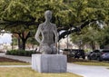 Sculpture of a kneeling woman made of steel plates on display in the Design District of Dallas, Texas