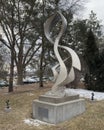 Stainless steel sculpture titled \'Spirit of Jesuit Education\' on the campus of Creighton University.