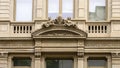 Sculpture of Mercury and Larunda on a building in Milan, Italy Royalty Free Stock Photo