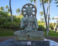 Sculpture of a seated Buddha outside at a resort on the Big Island, Hawaii. Royalty Free Stock Photo