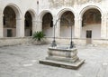 Sealed water well in center courtyard, Basilica di Santa Caterina d`Alessandria, Galatina, Italy