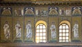 Upper two of three bands of mosaics on the left lateral wall of the Basilica of Sant Apollinare Nuovo in Ravenna, Italy