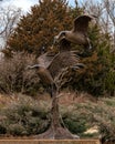 `Settling In` by Fred Boyer at the entrance to Sugar Hill residential district in Edmond, Oklahoma on Route 66.