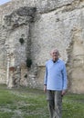 Seventy-five year-old Caucasian male tourist in the Fortress of the Lion in Castiglione del Lago, Italy.