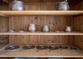 Shelves with copper utensils in the main kitchen in service of the Pena Palace in Sintra, Portugal. Royalty Free Stock Photo