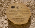 A sign marking the official launch of the restored Fortress of Shali on a wall in the Shali fortress in the Siwa Oasis