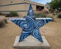 Six foot fiberglass star sculpture titled `The Wave`, by artist Danielle Zamangi in Arlington, Texas