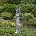 Springstone sculpture titled All Dressed Up by Tutani Mugabazi in the Fort Worth Botanic Garden.