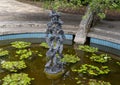 Springstone sculpture titled Fish Shoal by Shepherd Deve in the Fort Worth Botanic Garden.