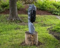 Springstone sculpture titled Spiritual Advisor by Augustine Mbirinyu in the Fort Worth Botanic Garden.