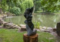Springstone sculpture titled Sun Bather by Raphael Machinjili in the Fort Worth Botanic Garden.