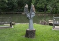 Springstone sculpture titled In Two Minds by Garrison Machinjili in the Fort Worth Botanic Garden.