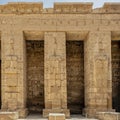 Square Pillars in the 2nd court of the Mortuary Temple of Ramesses III in Medina Habu. Royalty Free Stock Photo