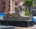 Red granite sphinx of Thutmose III in front of the Museum of Egyptian Antiquities in Cairo, Egypt.