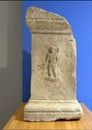 Statue base with low relief of Aulisua on display at the Archaeological Site of Volubilis in Morocco.