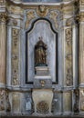 Statue of a male Saint in a side altar in the Sanctuary of Our Lady of Nazare, Portugal.