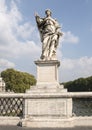 Marble Angel holding the nails used to crucify Christ on the Ponte Sant`Angelo Royalty Free Stock Photo