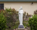 Statue of Mary and the infant Jesus in the Rosary Garden at Saint Joseph Catholic Church in Arlington, Texas.