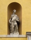 Statue of the Muse of Tragedy on the exterior of the Teatro Alighieri, an opera house in Ravenna, Italy.