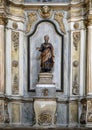 Statue of a man in a side altar in the Sanctuary of Our Lady of Nazare, Portugal.