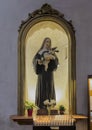 Statue Saint Rita da Cascia in the Church of Santa Maria Sopra Minerva in the Communal Square of Assisi in Italy. Royalty Free Stock Photo