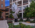 Steel bird landing sculpture by unidentified artist in Dallas, Texas.