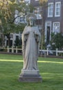 Stone Statue of Sacred Heart of Jesus Christ, Amsterdam Begijnhof Royalty Free Stock Photo