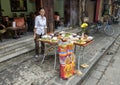 Street Vendor selling food and Tet supplies in Hoi An, Vietnam