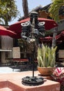Surrealistic male saxophone-player sculpture in the courtyard of the La Coronela Restaurnt & Bar in Todos Santos.
