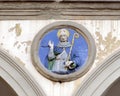 Terracotta relief of a Franciscan saint by Andrea della Robbia in a spandrel of the Hospital of San Paolo in Florence, Italy. Royalty Free Stock Photo