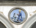 Terracotta relief of a Franciscan saint by Andrea della Robbia in a spandrel of the Hospital of San Paolo in Florence, Italy. Royalty Free Stock Photo