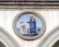 Terracotta relief of a Franciscan saint by Andrea della Robbia in a spandrel of the Hospital of San Paolo in Florence, Italy. Royalty Free Stock Photo