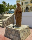 Terracotta sculpture of Saint Joseph holding his son Jesus at the Mission of San Jose del Cabo.