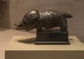 Carved wooden figure of a pangolin on display in the Dallas Museum of Art in Dallas, Texas.