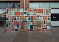 Thanksgiving mural with pumpkins, leaves and geometric shapes by artist Mari Pohlman at Mockingbird Station in Dallas, Texas.