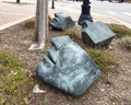 Bronze sculptures titled \'Face Fragment IV, III and II\' by Susan Evans in downtown Edmond, Oklahoma.