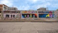 Three murals on the outside of the Deep Ellum Art Company in Deep Ellum in East Dallas, Texas.