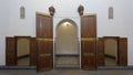 Three sets of cedar wood painted open doors in the Bahia Palace in Marrakesh, Morocco.