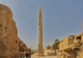 Thutmose I Obelisk with the 3rd Pylon and Amenhotep III Court in the background in the Karnak Temple complex near Luxor, Egypt.