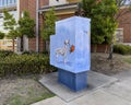 Traffic signal box painting by artist Karen Cox at Fire Station #1 in Grand Prairie, Texas.