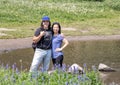 Twenty-two year-old Amerasian male and his mother enjoying a break from a hike in Mount Rainier National Park, Washington Royalty Free Stock Photo