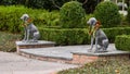 Grey statues of labrador retrievers sitting in front of an expensive home in Highland Park, Dallas Royalty Free Stock Photo