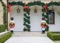 Two nutcrackers guarding the steps at the end of the front sidewalk to an expensive home in Dallas, Texas Royalty Free Stock Photo