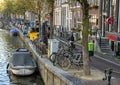 Typical street and houses along a canal, Amsterdam, The Netherlands Royalty Free Stock Photo
